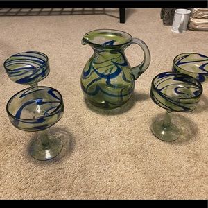 Hand blown margarita pitcher and 4 glasses. Like new condition.